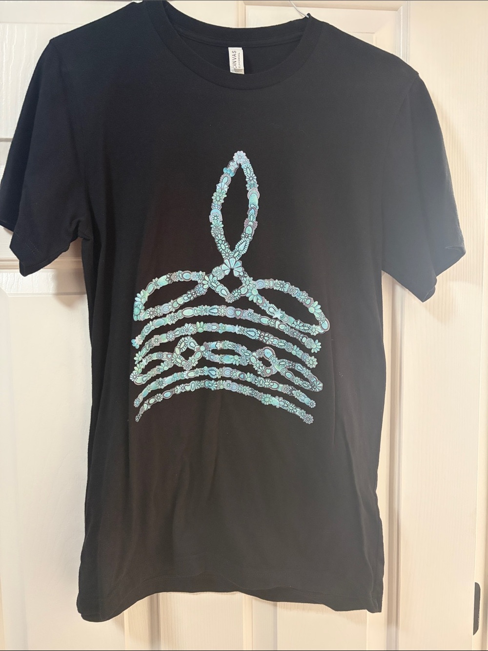 Bella Canvas Black Short-Sleeve Tee with Turquoise Floral Crown Graphic